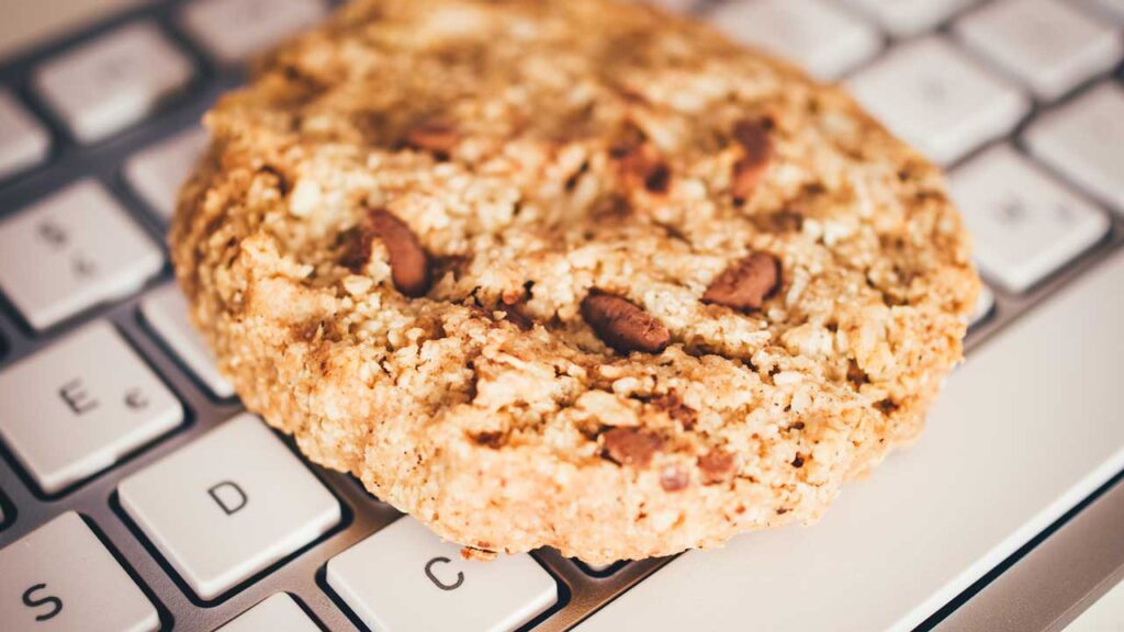 chocolate chip cookie on keyboard