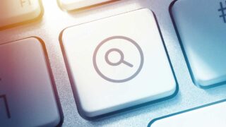 magnifying glass icon on a keyboard key