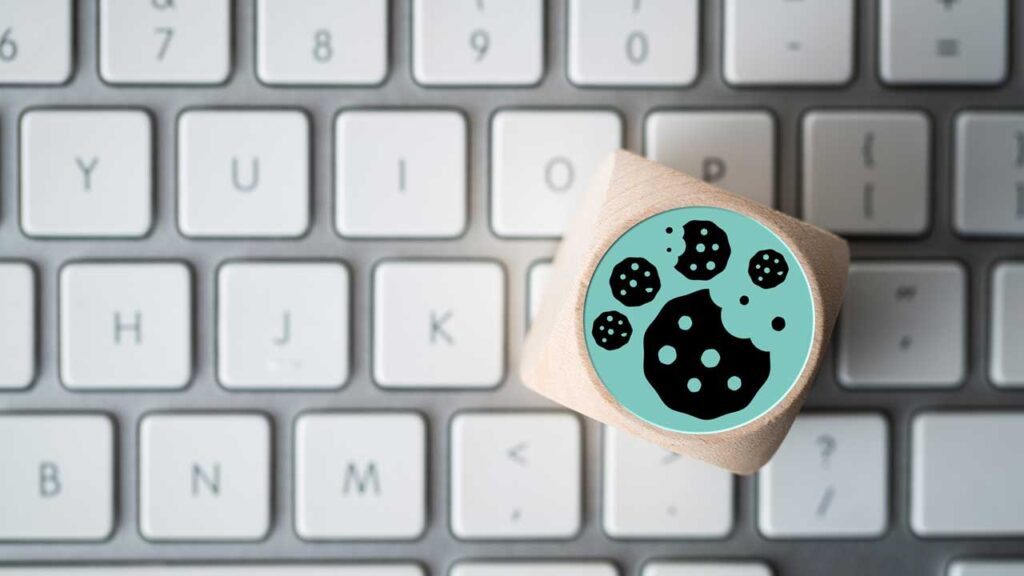 cube with cookie sticker on a keyboard