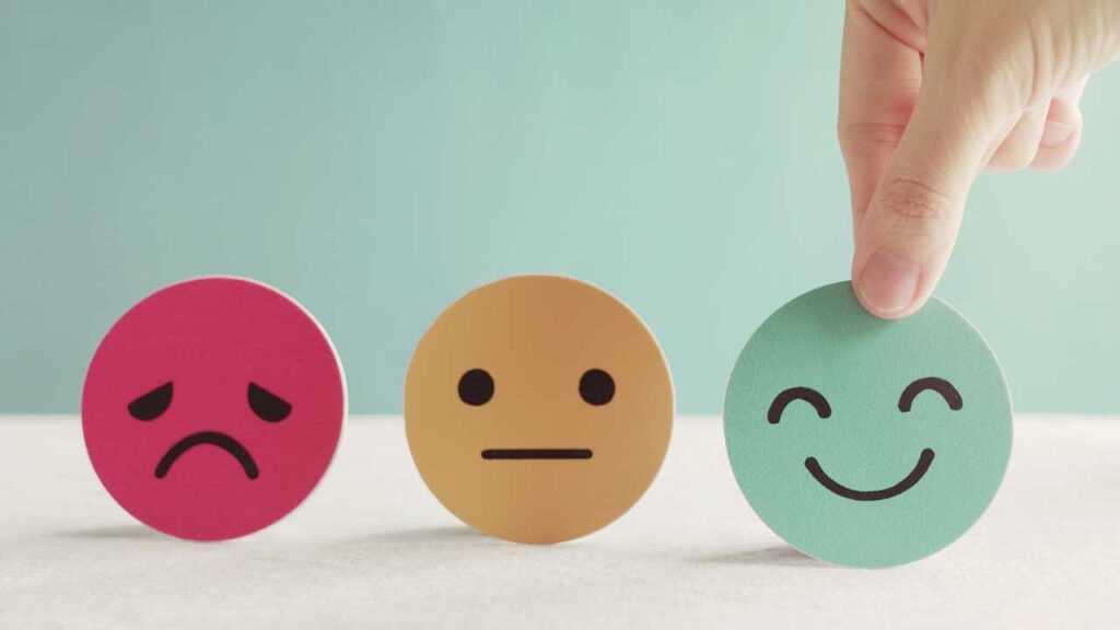 sad, meh and happy face
