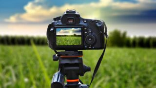 digital camera taking photos of field