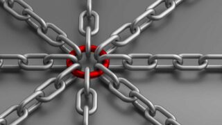 chains linked to a red ring