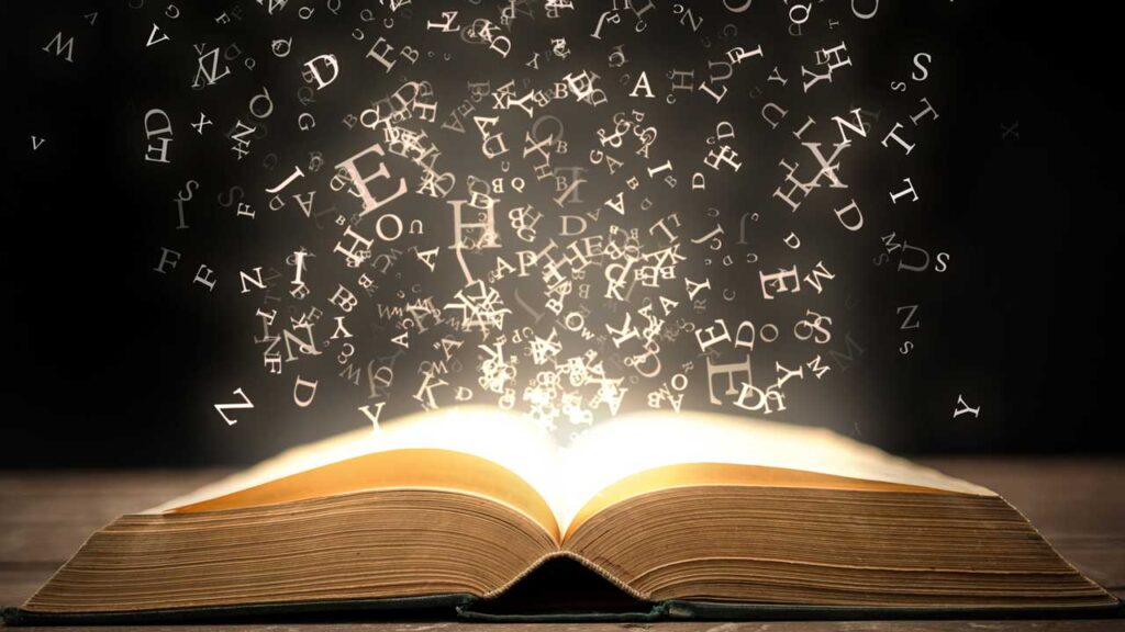book with letters flying out like magic