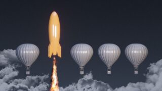 rocket blasting past hot air balloons