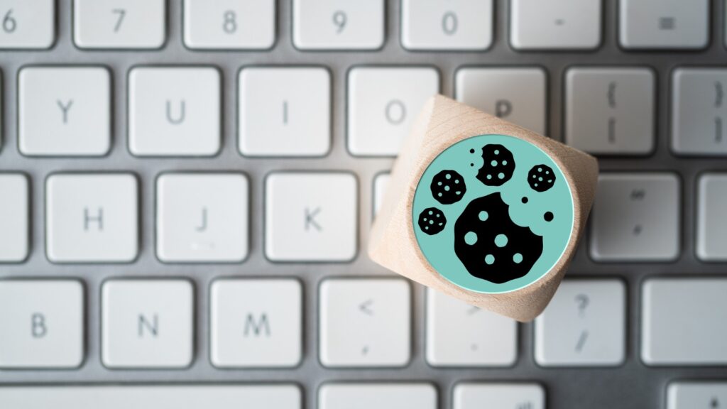cube with cookies sitting on keyboard