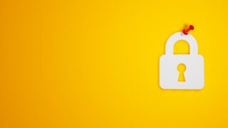 padlock pinned to wall