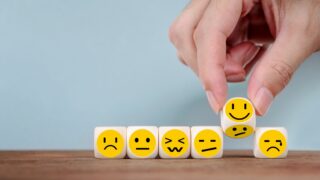 dice with emoticons