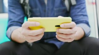 person playing game on phone