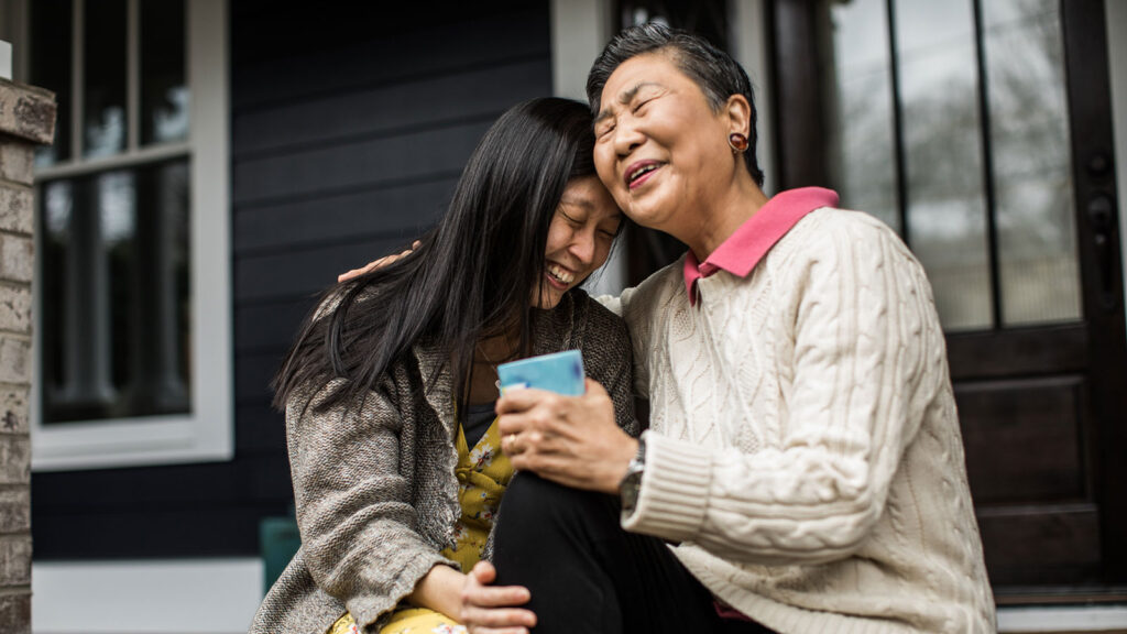 Asian American family hugging