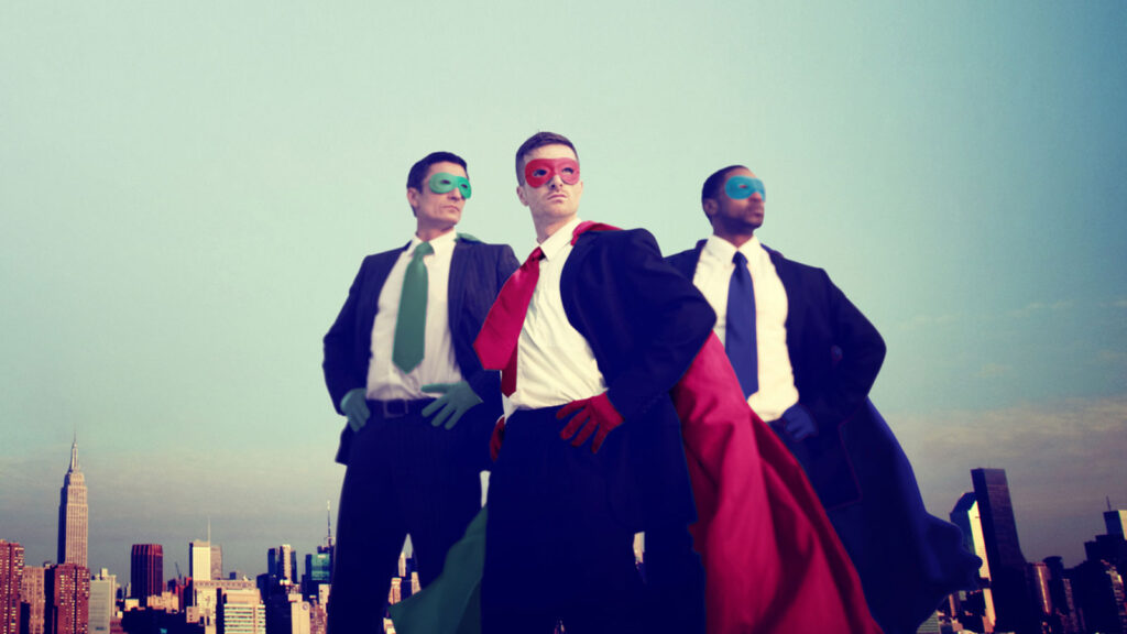 3 men in suits as superheroes