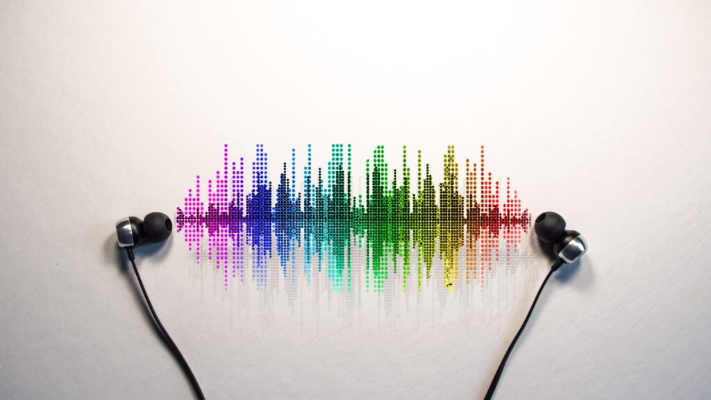 rainbow city skyline between ear buds