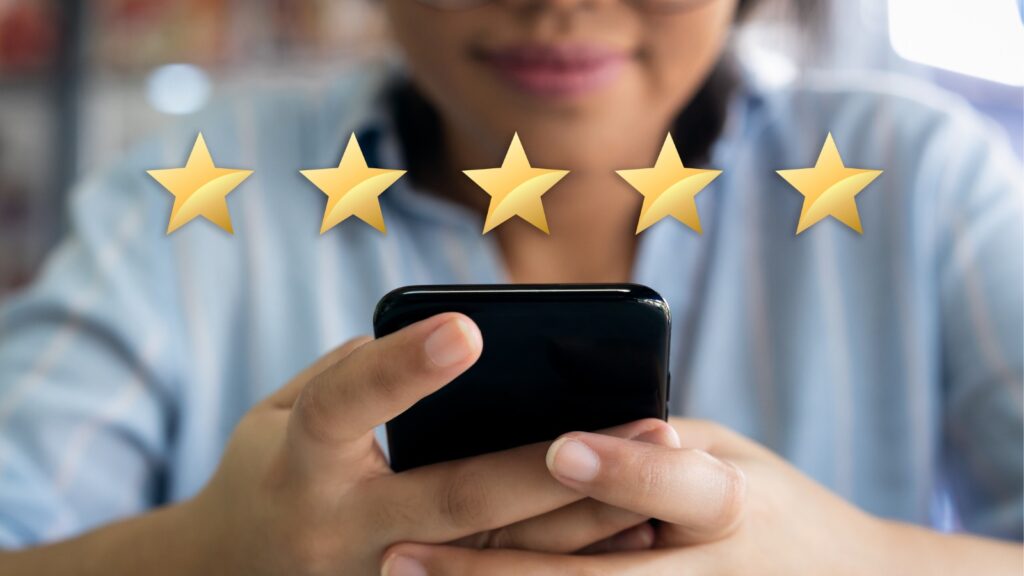 woman-using-cell-phone-with-5-gold-star-customer-satisfaction-graphic-picture