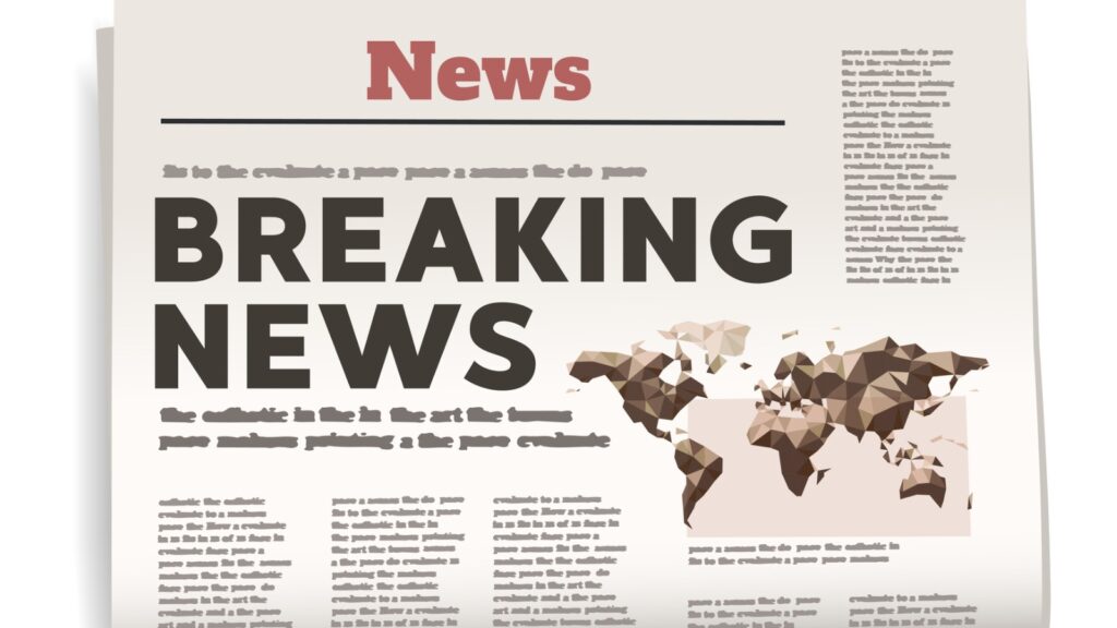 Breaking News headline on a newspaper