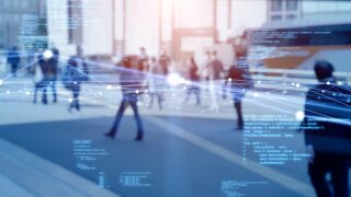 abstract image of data points overlayed on image of people walking in city