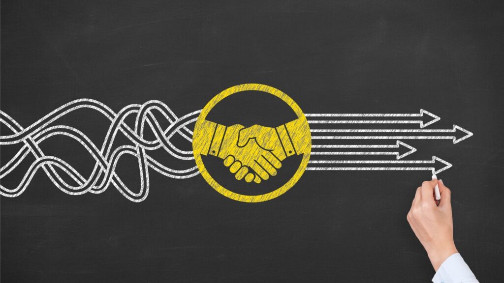 Solution Concepts with Handshake on Chalkboard Background