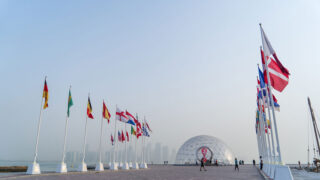 Flags of the qualified countries for the FIFA World Cup Qatar 2022 at Corniche Doha