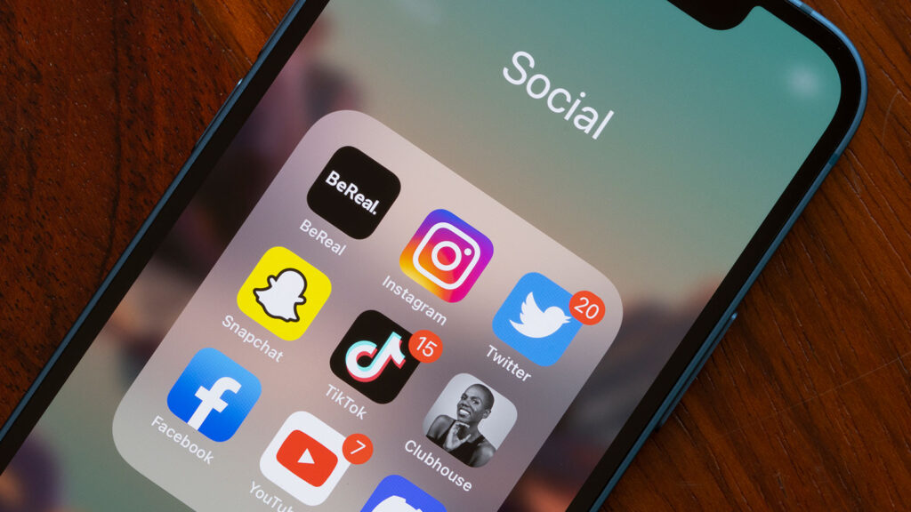 Photo of a smartphone featuring social media icons