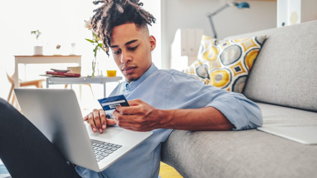 Young man working at home stock photo