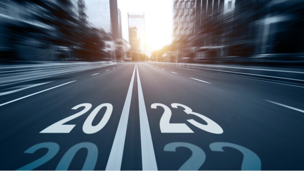 City street with new year number 2023 and 2022 stock photo