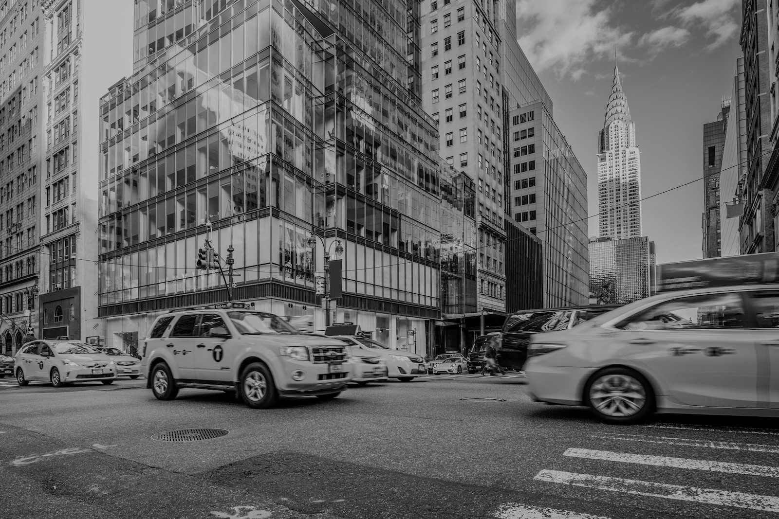 Yellow taxis on busy street in New York City